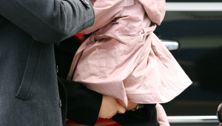 Suri Cruise stays warm and fashionable