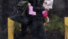 Nicole, Keith & Sunday Rose brave the rain