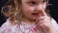 Picking their nose