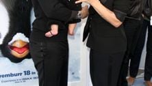 A photo of Pink, Carey Hart and the BABY, at last!