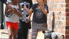 Maddox, Zahara and a very short-haired Shiloh walk their dog!