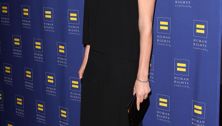 Charlize Theron: Swaddling looks "like a straightjacket"