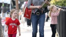 Marcia Cross takes the twins to school