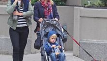 Liev Schreiber and Naomi Watts' kids ride on shoulders