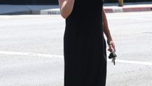 Pregnant Anna Faris puts comfort first in a long black dress