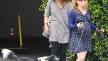 Pregnant Anna Paquin walking her dog in cute maternity dress