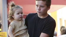 Brooklyn Beckham carries little sister Harper: Aww!