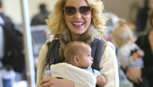 Happy Katherine Heigl with baby Adalaide in a baby carrier