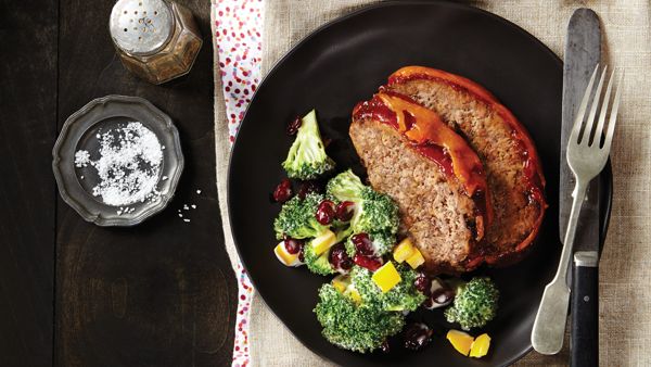 plate of meatloaf with broccoli salad