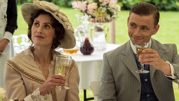Promo image for A Fortunate Man showing a man and woman in period wear at a picnic luncheon