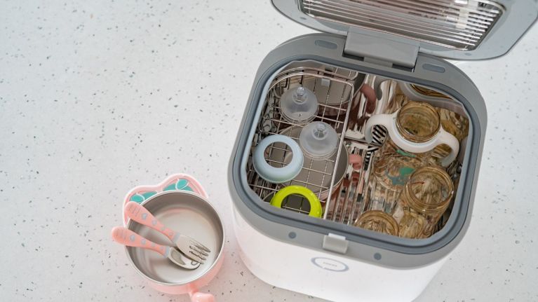 tabletop sanitizer full of kid and baby products