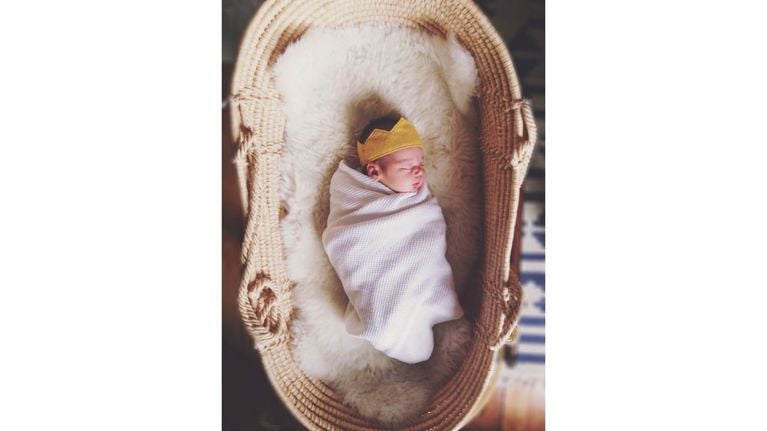 Baby too big for moses shop basket too small for cot