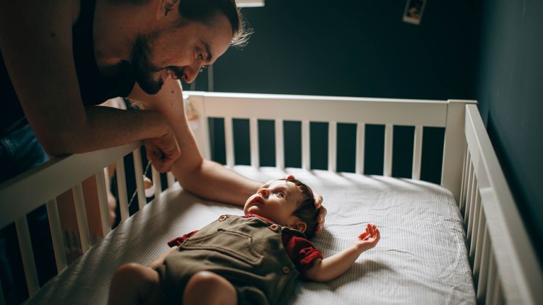 Father interacting with his baby boy,