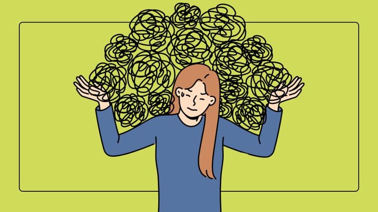 : A digital illustration of a woman with long brown hair, wearing a blue sweater, raising her hands in a helpless gesture. Behind her head, there are black tangled scribbles representing overwhelming thoughts or mental load. The background has a pattern of teal polka dots on a light green surface.