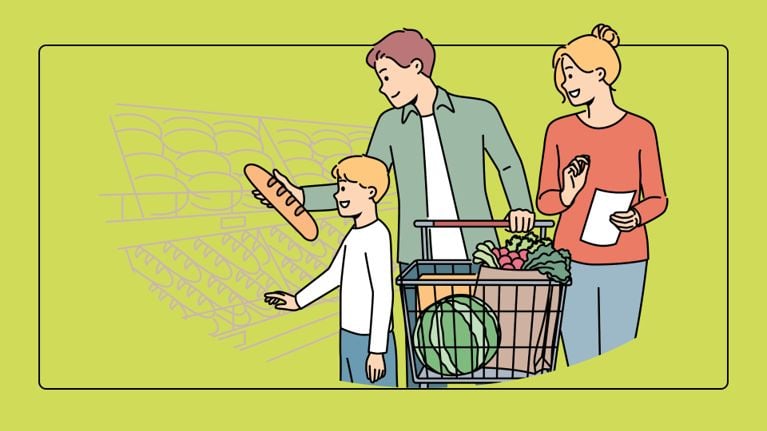 A family of three is shown in a grocery store. The father and young son are selecting a baguette from a shelf, while the mother stands nearby with a full cart, looking at a written shopping list, depicting the coordination required for family errands.