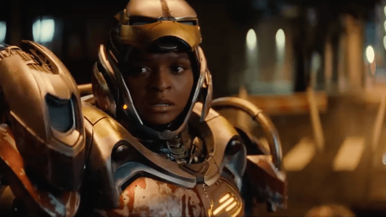 A young girl in a suit of armor