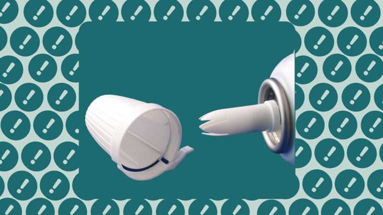A close-up of a whipped cream dispenser and its plastic nozzle, emphasizing the tip of a nitrous oxide canister. The background features a teal and light blue pattern with repeating exclamation marks, signaling a warning.