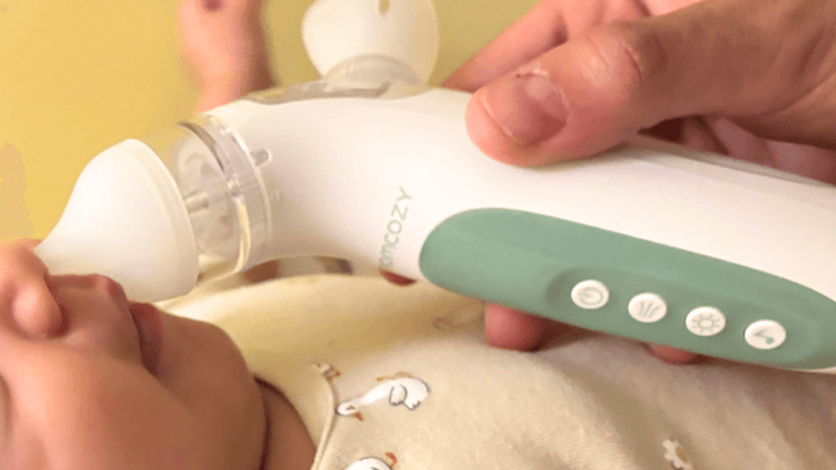 Momcozy  2-in-1 Spray & Suction Electric Nasal Aspirator Review: The Soothing Essential Every Parent Needs