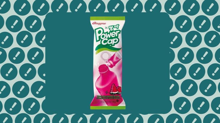 Product package of Binggrae Power Cap Watermelon Flavored Ice Tube, a bright pink frozen treat, displayed against a blue-green patterned background with exclamation icons.