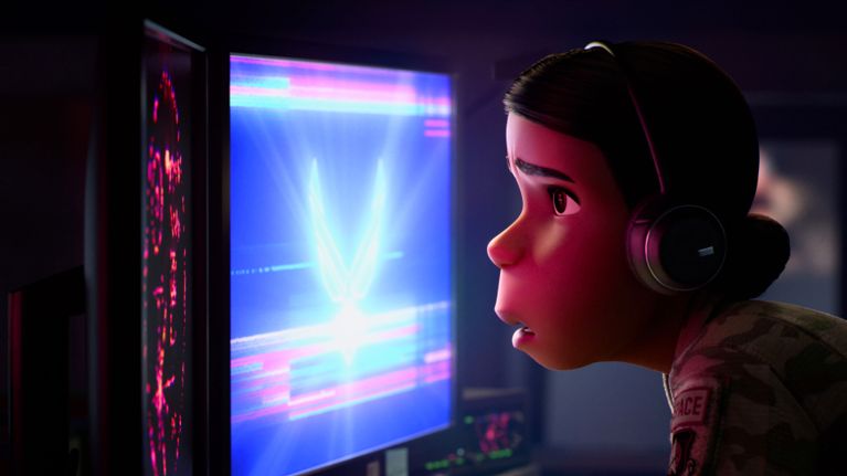 A still from the animated movie Elio showing the character Olga peering at a computer screen