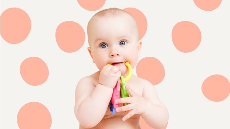A woman checking the incoming teeth of a baby