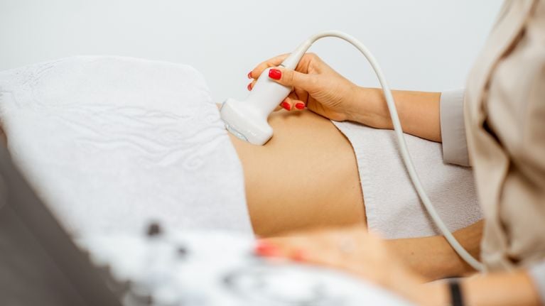 A woman receiving an ultrasound
