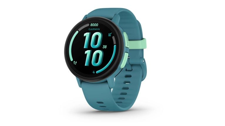 A standalone teal Garmin Bounce 2 kids’ smartwatch on a white background, displaying its bright, easy-to-read main screen.
