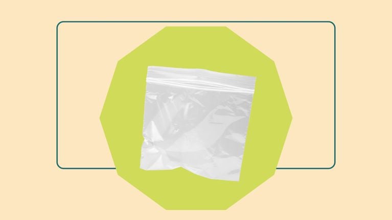 A transparent resealable bag, ideal for organizing small items or sealing away soiled baby clothes during a day out.