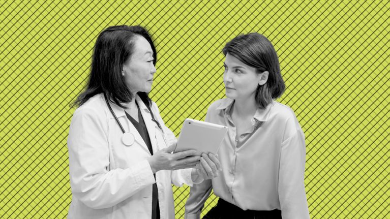 A healthcare provider showing information on a tablet to an adult patient during a medical consultation, on a green graphic background.