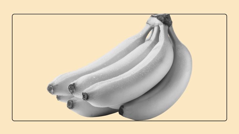 Monochrome bunch of bananas with water droplets against a peach background within a rounded rectangular frame.