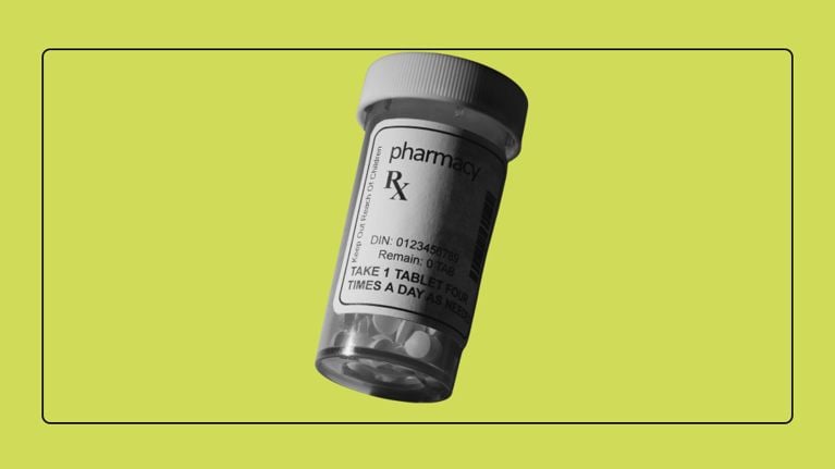 A standard orange prescription pill bottle with a white cap against a green background.