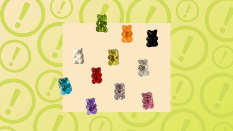 Multicolored gummy bears on a lime green background with circular exclamation mark alert icons.
