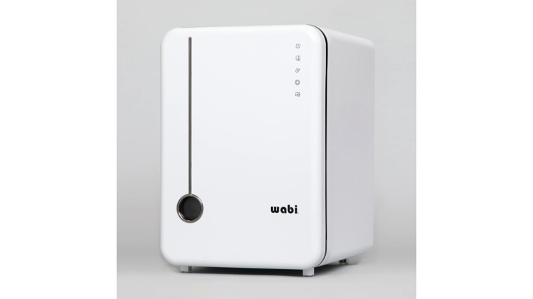 A modern, countertop baby bottle sterilizer featuring a clean white aesthetic. The front panel includes the Wabi logo, a vertical silver accent, and a touch-sensitive icon menu for various sterilization and drying cycles.