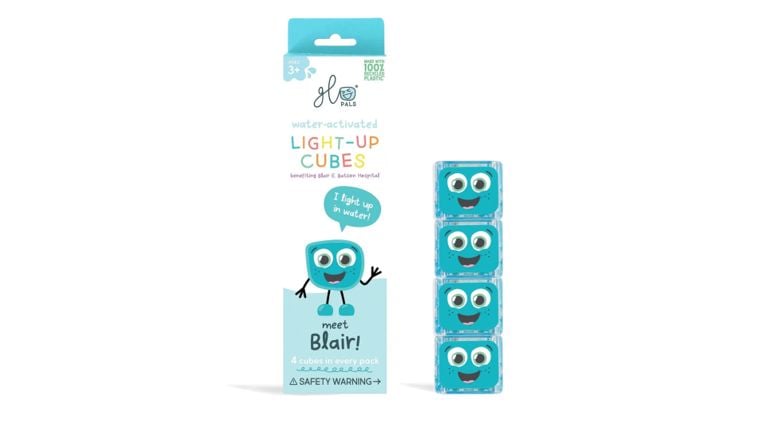 Packaging for Glo Pals "Blair" water-activated light-up cubes alongside four blue glowing character cubes.