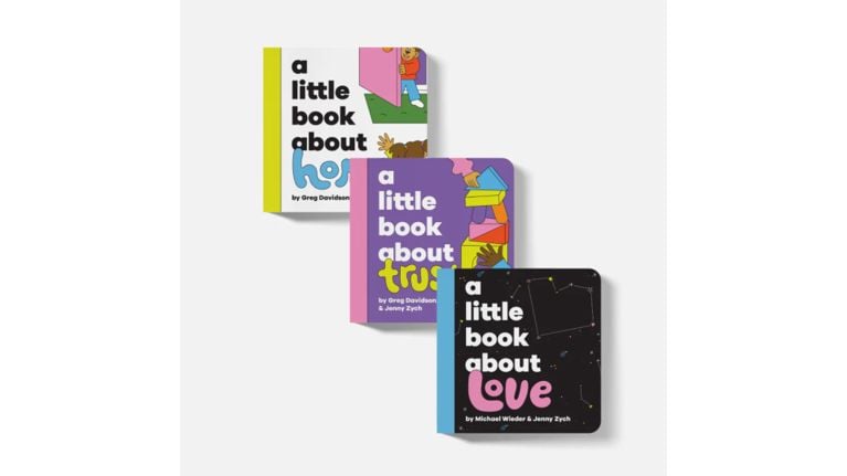 Three board books from "A Little Book About" series titled Hope, Trust, and Love, stacked diagonally.
