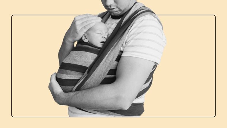 A black-and-white cutout image of a man holding a sleeping newborn baby securely against his chest in a striped fabric baby wrap. The man gently rests one hand on the baby’s head while supporting the baby's body with his other arm. The cutout is centered against a solid, light beige background and framed within a thin, black rectangular border with rounded corners.