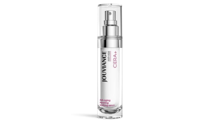 Jouviance CERA+ anti-aging repairing soothing serum in a clear pump bottle on a white background.