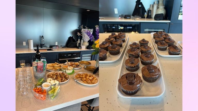 Baby shower food and drinks, themed cupcakes on a party room kitchen island