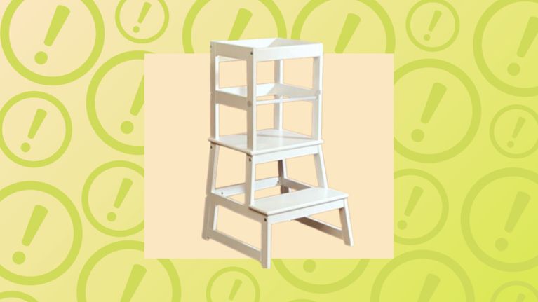 White wooden toddler tower with steps and guard rails, displayed against a yellow background with green warning icons.