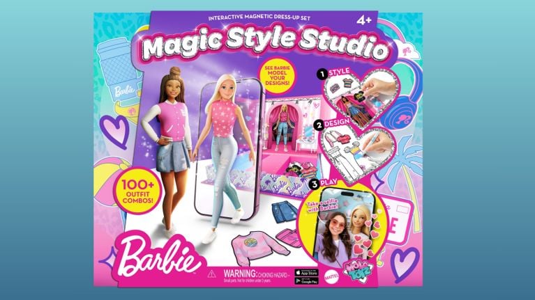 Box art for Barbie Magic Style Studio, an interactive magnetic dress-up set for ages 4+, showing Barbie and a second doll beside a phone screen, outfit-design steps, a selfie feature, and text promising 100+ outfit combos.