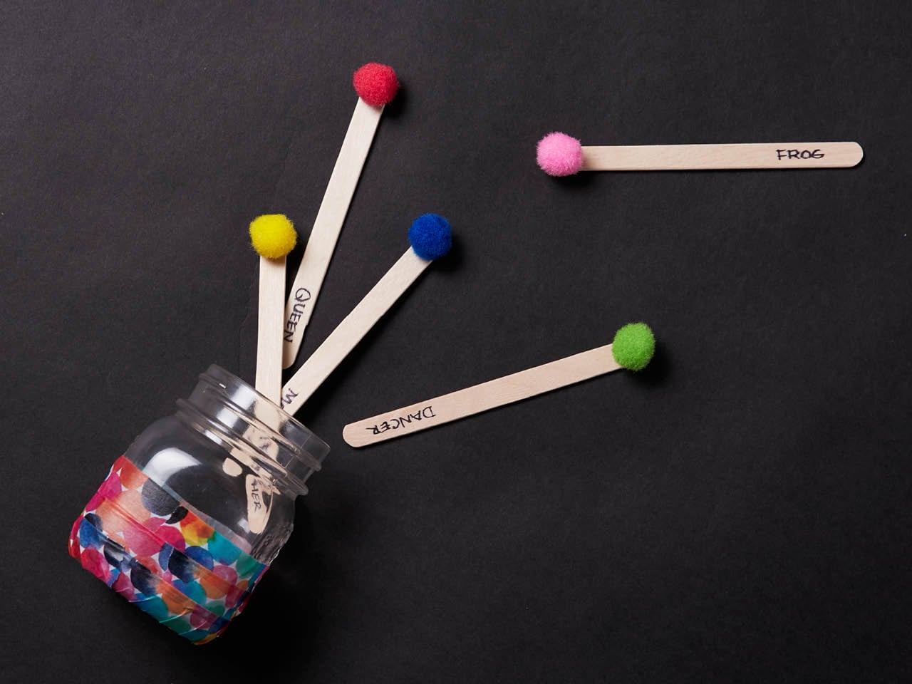 mason jar filled with popcicle sticks