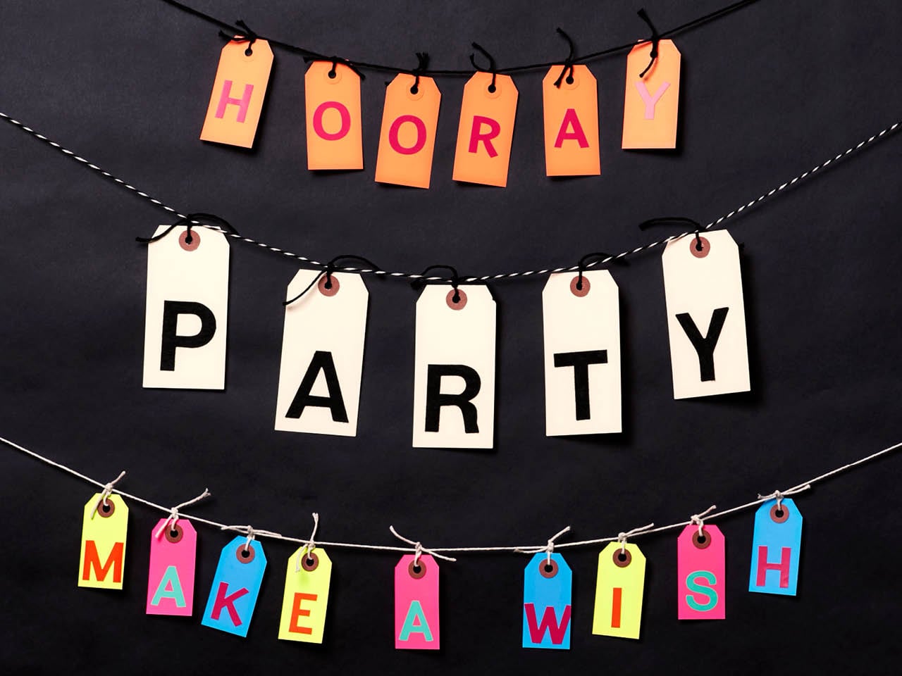 three types of bunting made from parcel labels