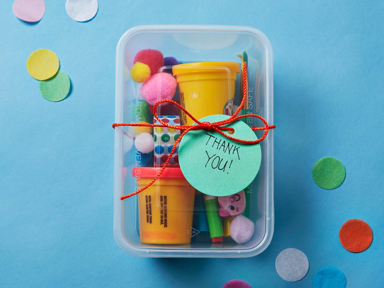 container with birthday loot