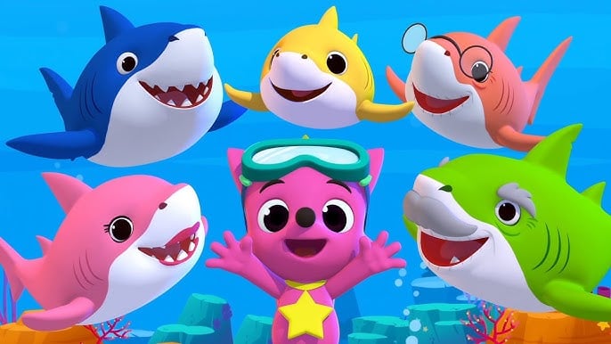 Mommy Shark, Daddy Shark, Baby Shark Grandma Shark and Grandpa Shark smile. Pink Fong the fox stands in the middle.