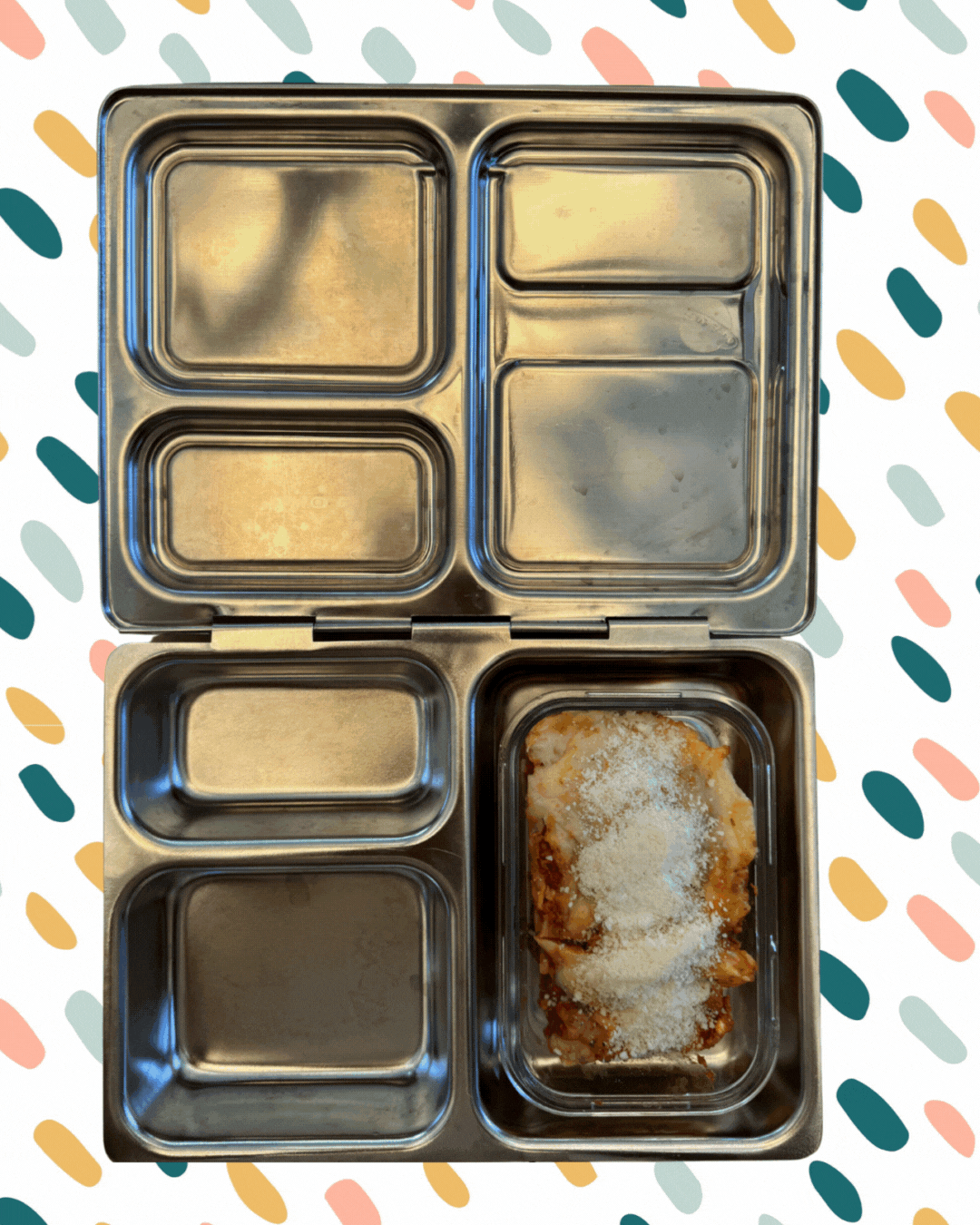 An animated GIF showing a stainless steel bento-style lunchbox being packed. The sequence adds slices of watermelon, carrot and cucumber sticks with a small container of dip, and a serving of lasagna topped with grated cheese. The background features a playful pattern of colorful oval shapes in teal, pink, mustard, and light green.